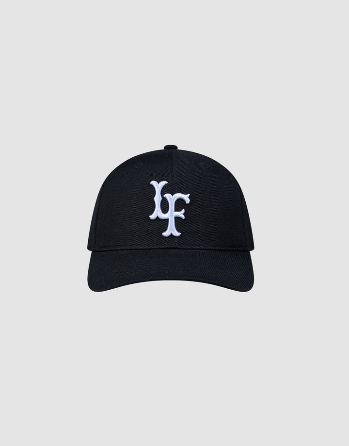 The LFDY Snapback by LIVE FAST DIE YOUNG features a black design, curved brim, white embroidered multi-logo on the front, and an adjustable snap closure. Shown against a plain light gray background. ONE SIZE fits most.