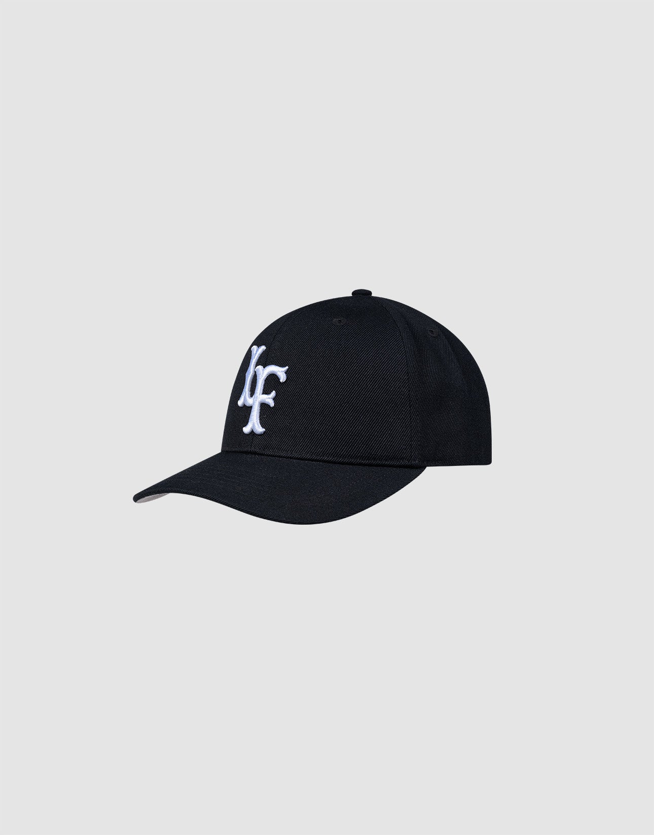 The LFDY Snapback by LIVE FAST DIE YOUNG is a black cap with a curved brim, Snapverschluss, and white embroidered NY letters. It features a ONE SIZE fit and is displayed on a plain light gray background.