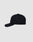 The LFDY Snapback by LIVE FAST DIE YOUNG is a plain black cap with a curved brim and visible panel stitching, shown in side view on a light grey background. It features an adjustable Snapverschluss for comfort.