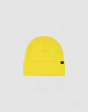 The LIVE FAST DIE YOUNG Basic Beanie is a bright yellow Polyacryl knit hat with a folded brim and small black flaglabel on the left, shown against a plain light gray background. One size for versatile comfort.