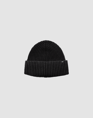 The Washed Rib Knit Beanie by LIVE FAST DIE YOUNG in black Baumwolle features a folded cuff with a small tag, shown on a plain light gray background.