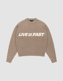 The Live Fast Boucle Sweater by LIVE FAST DIE YOUNG is an oversize beige knit with "LIVE FAST" in bold white on the chest, classic crew neck, and long sleeves for cozy comfort. | plain