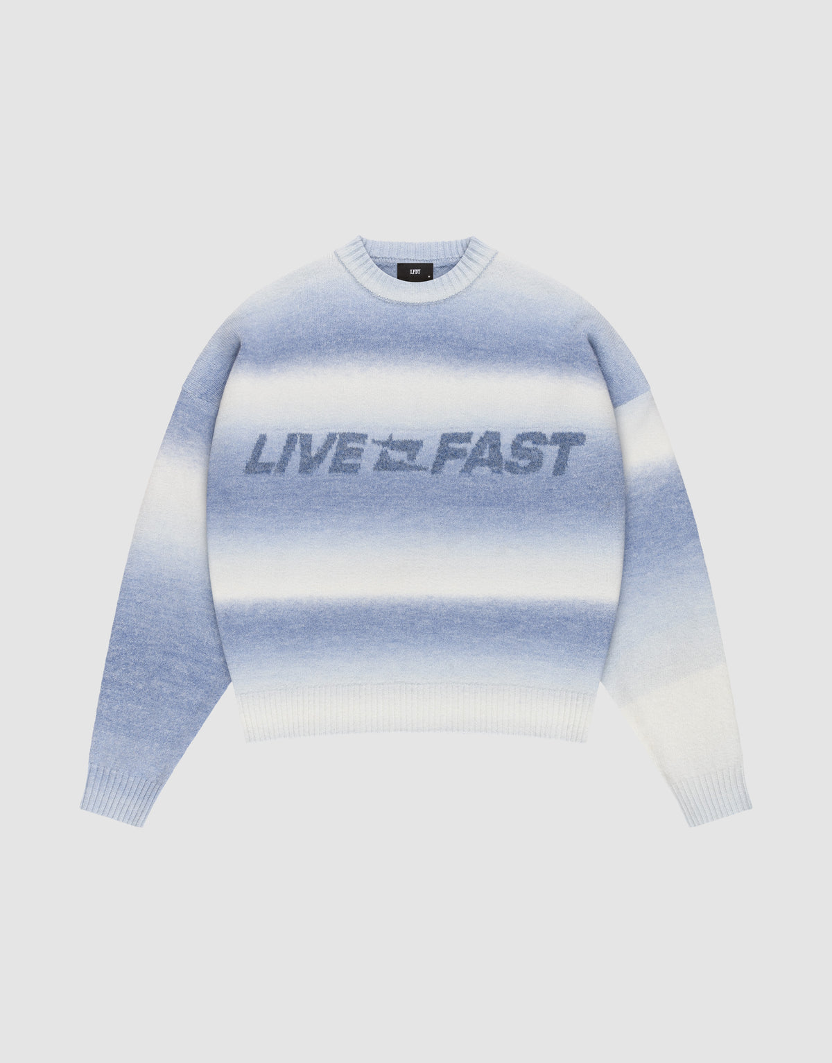 The Live Fast Boucle Sweater by LIVE FAST DIE YOUNG features a blue-white gradient, oversize fit, long sleeves, and bold "LIVE FAST" text on the front. | plain