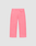 The Live Fast Boucle Pants by LIVE FAST DIE YOUNG are pink terry cloth lounge pants featuring a Wide Fit, elastic waistband, straight legs, and a single right patch pocket, shown against a plain light gray background.