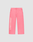 The Live Fast Boucle Pants by LIVE FAST DIE YOUNG feature a bright pink wide fit, elastic waistband, side pockets, and “LIVE FAST” in bold white text vertically on the left leg.
