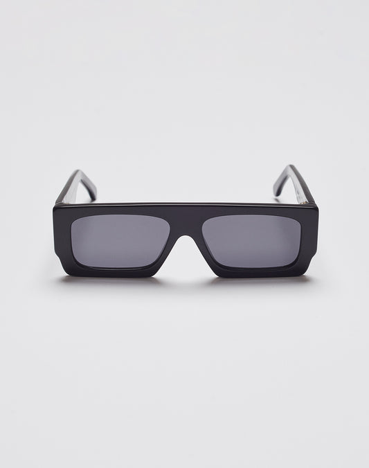 The LIVE FAST DIE YOUNG Live Fast Shades are black, rectangular sunglasses with thick polished LAES acetate frames and dark lenses providing 400 UV protection, shown facing forward on a plain white background.