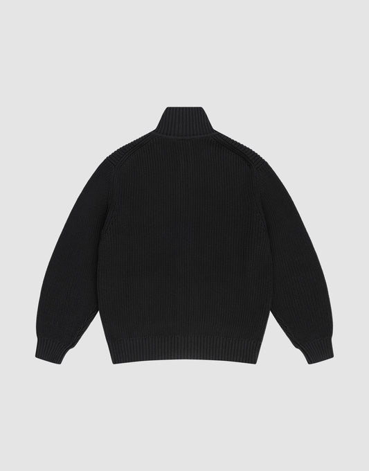 The LFDY Knit Jacket by LIVE FAST DIE YOUNG is a black, long-sleeve knit sweater with raglan sleeves, ribbed cuffs and hem, and a stand-up collar. Made from 100% Baumwolle, it is shown laid flat with the back facing up.