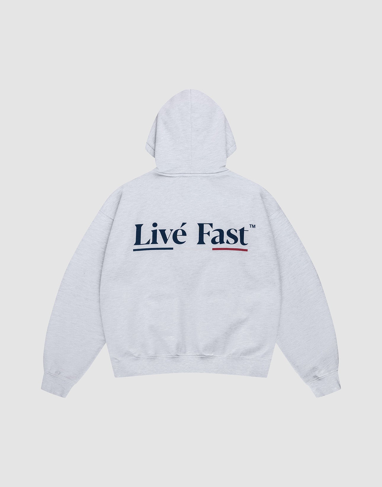 The Live Fast Paris Hooded by LIVE FAST DIE YOUNG is an oversized, light gray cotton hoodie with a bold "Livé Fast" black backprint and red underline, displayed flat on a plain white background. | plain