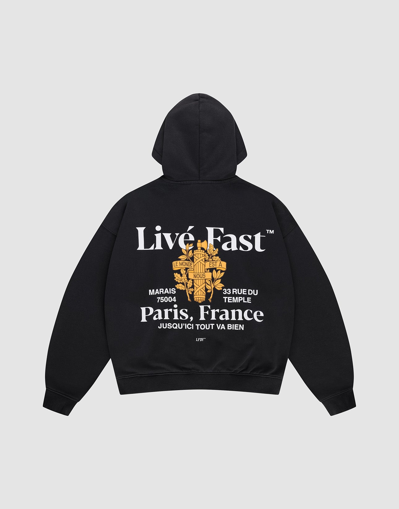 The LFDY Paris Hooded Zip by LIVE FAST DIE YOUNG is an oversized black cotton hoodie with front and back prints: features white “Live Fast” and “Paris, France” text, a gold floral cross graphic, small white text, and a street address.