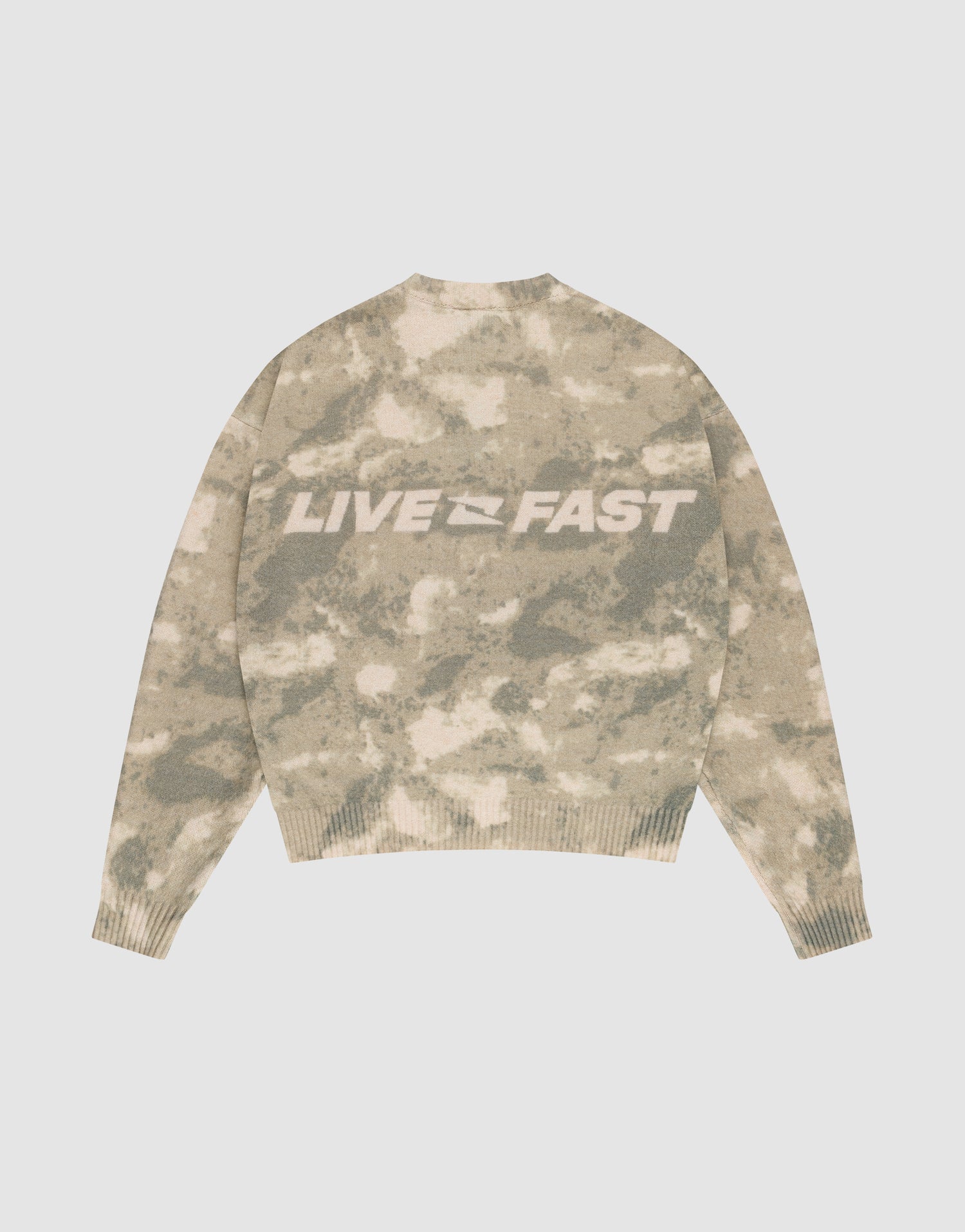 The Live Fast Boucle Sweater by LIVE FAST DIE YOUNG features a beige and light brown camo pattern, an oversized fit, and bold white "LIVE FAST" lettering on the back. | plain