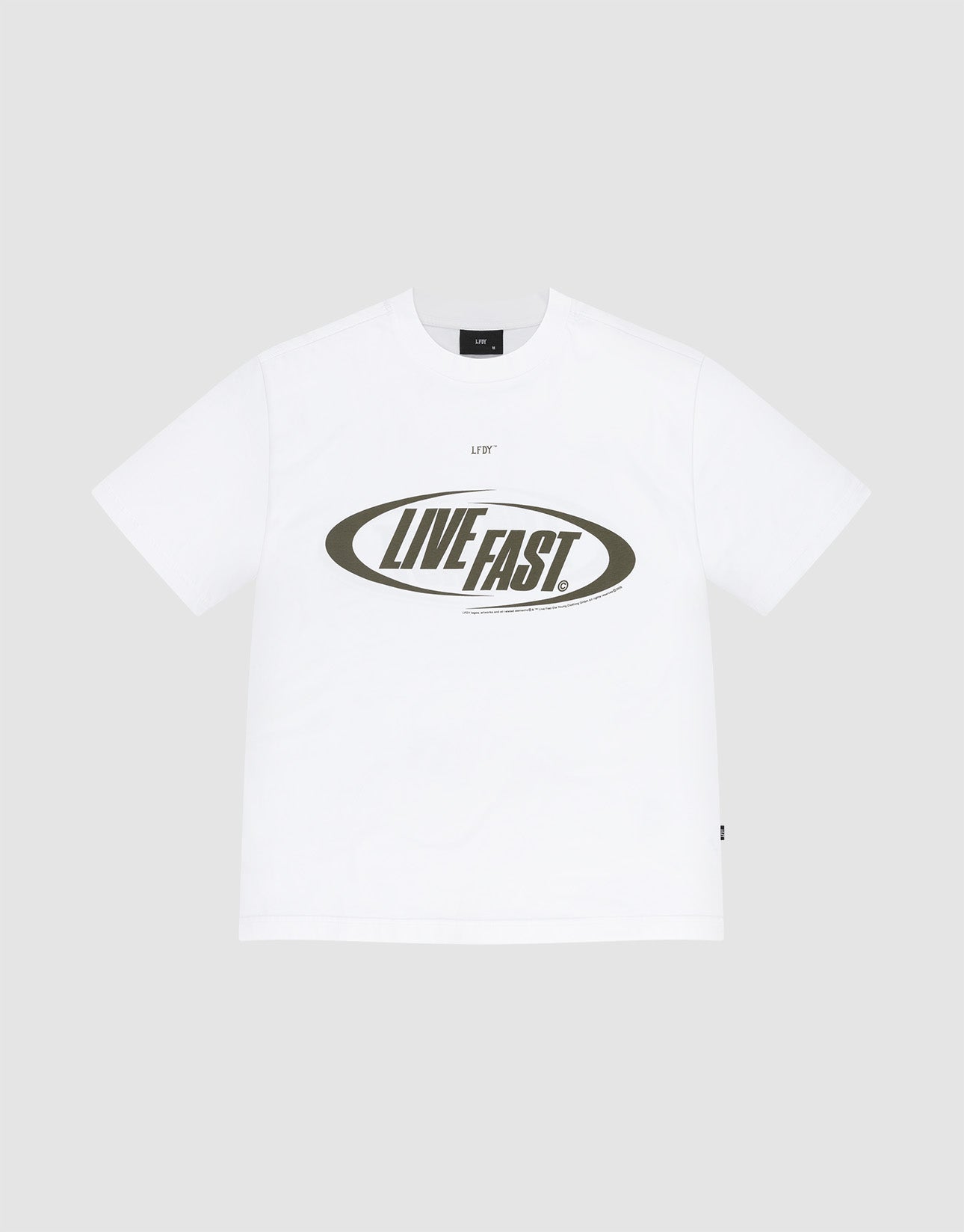 The LFDY Sphere Tee by LIVE FAST DIE YOUNG is an oversized white cotton short-sleeve t-shirt with a bold, uppercase LIVE FAST. oval front print on a plain light gray background.