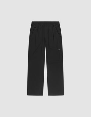 LFDY Performance Pants by LIVE FAST DIE YOUNG, featuring a black straight-leg design with an elastic waistband, side pockets, and a small white LFDY logo on the left thigh, displayed on a plain light gray background. | plain