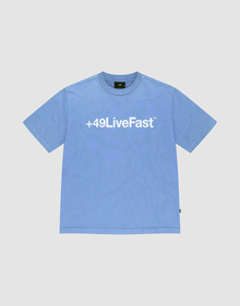 The Basic +49 Tee by LIVE FAST DIE YOUNG is a light blue oversized short-sleeve shirt with a bold white +49LiveFast™ front print, made from 100% Baumwolle and shown flat on a plain white background. | plain