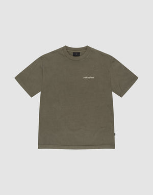 The Basic +49 Chest Tee by LIVE FAST DIE YOUNG is an olive green oversized t-shirt with a crew neck and small white "+49" logo on the left chest, made from 100% cotton and displayed flat on a light gray background. | plain