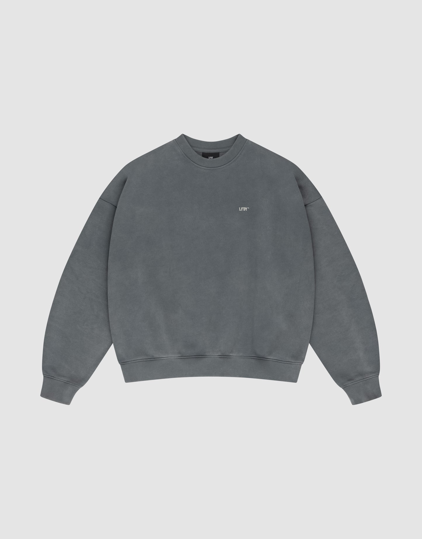 The Basic Chest Sweater by LIVE FAST DIE YOUNG is a plain, oversized faded grey crewneck with soft cotton, long sleeves, ribbed trims, and a subtle white OFF front print on the left chest.