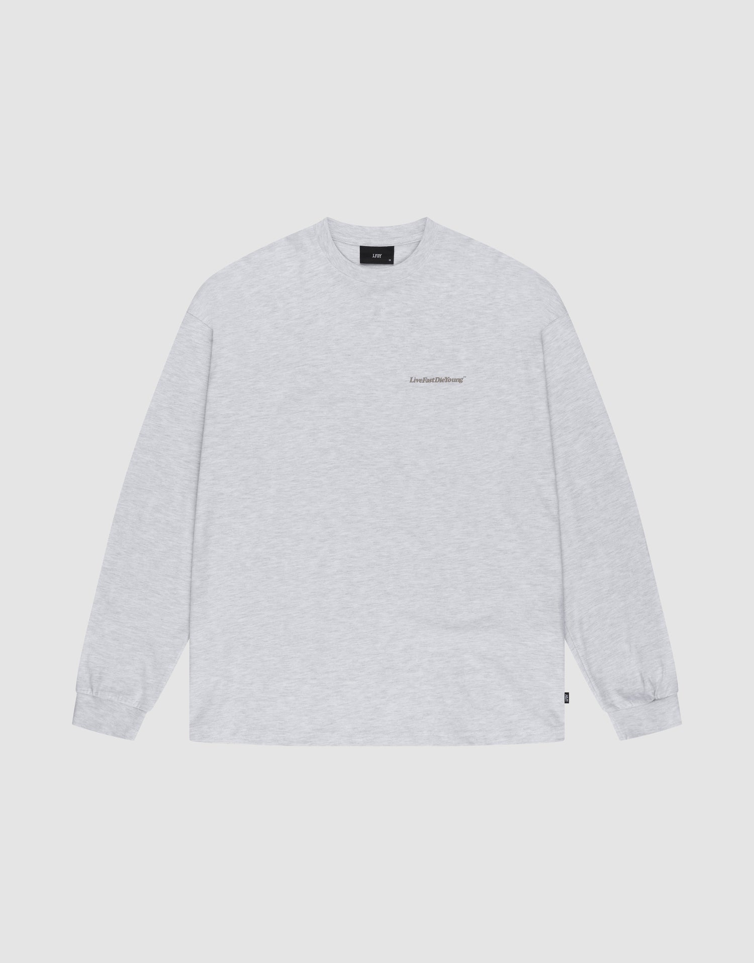 The LIVE FAST DIE YOUNG Basic Longsleeve is an oversized, light gray crewneck shirt with long sleeves and a small logo print on the left chest, shown laid flat on a white background. | plain