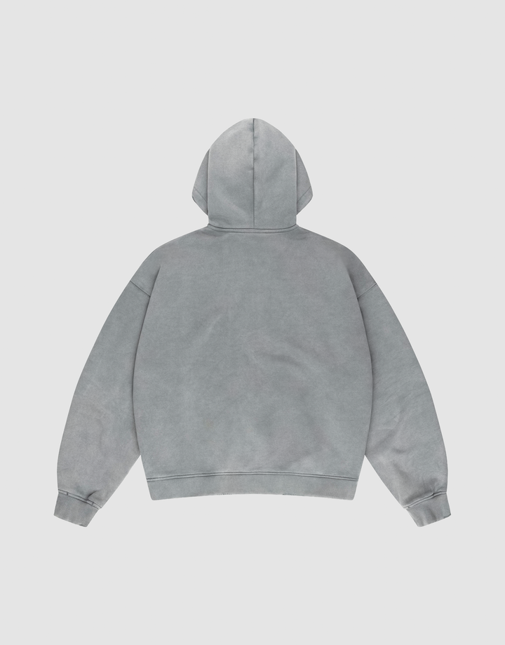 The LIVE FAST DIE YOUNG Basic Hooded Zip, an oversized light gray hoodie, is displayed on a flat white background from the back, with the hood up and sleeves slightly spread.