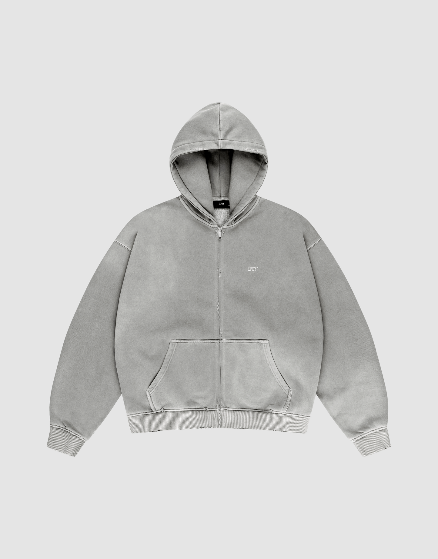 The LIVE FAST DIE YOUNG Basic Hooded Zip is a light gray zip-up hoodie with a hood, front pockets, and a small LIFT logo on the left chest, shown on a matching gray background.