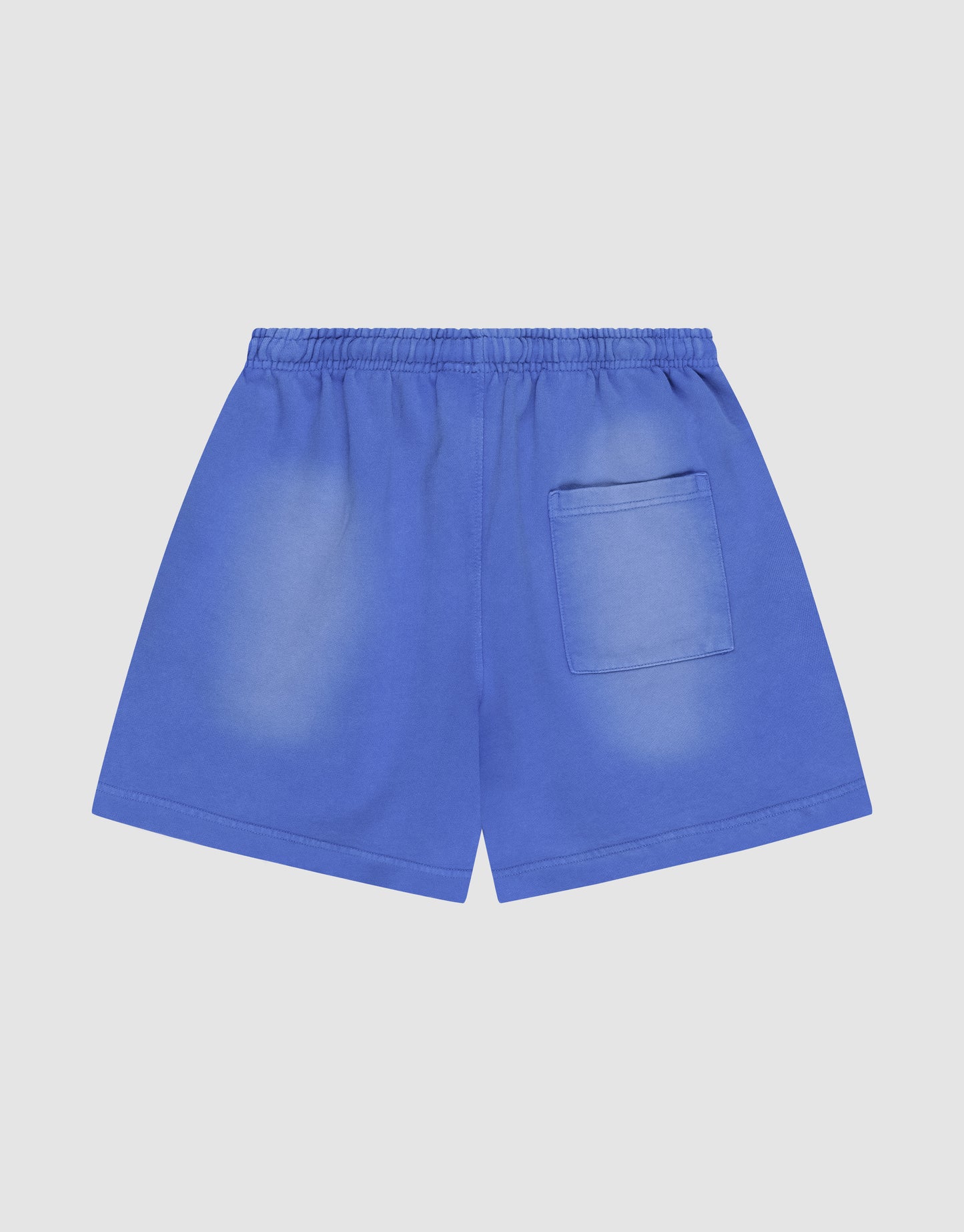 LIVE FAST DIE YOUNG Basic Sweat Shorts in bright blue, featuring an elastic waistband, subtle logo print, and a single back patch pocket, displayed on a plain light background.
