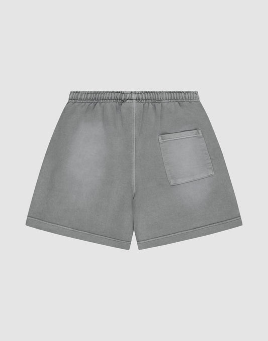 LIVE FAST DIE YOUNG Basic Sweat Shorts with an elastic waistband, single right back pocket, oversized fit, and subtle faded look, shown on a plain light background.