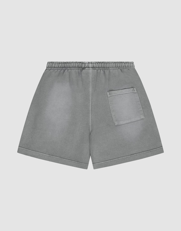 LIVE FAST DIE YOUNG Basic Sweat Shorts with an elastic waistband, single right back pocket, oversized fit, and subtle faded look, shown on a plain light background.