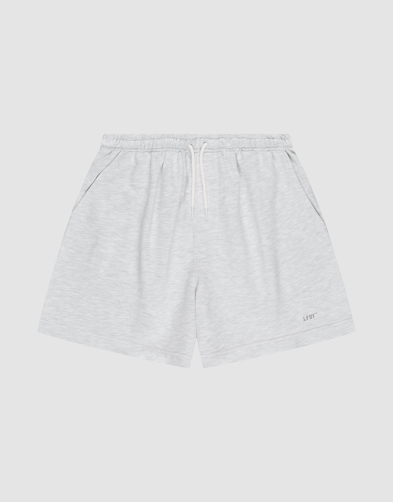 LIVE FAST DIE YOUNG Basic Sweat Shorts in light gray, featuring an elastic waistband, white drawstring, side pockets, and a small LIFTC logo print on the left leg, displayed flat on a plain white background.