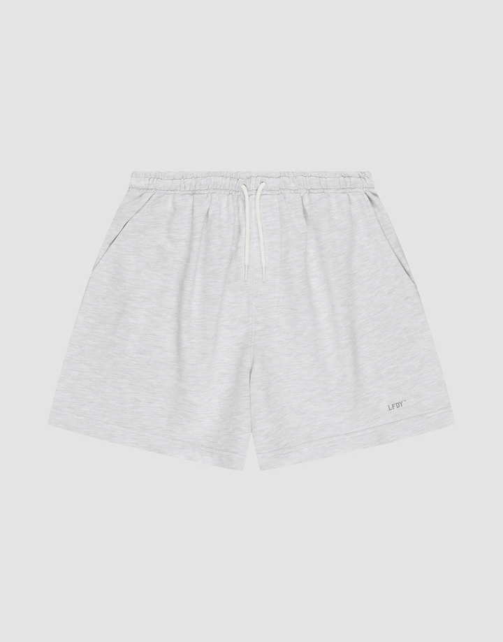 LIVE FAST DIE YOUNG Basic Sweat Shorts in light gray, featuring an elastic waistband, white drawstring, side pockets, and a small LIFTC logo print on the left leg, displayed flat on a plain white background. | plain