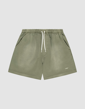 LIVE FAST DIE YOUNG Basic Sweat Shorts in olive green with an elastic waistband, white drawstring, side pockets, oversized fit, subtle faded look, and "LIFTO" logo on the left leg. Shown on a plain light grey background. | plain