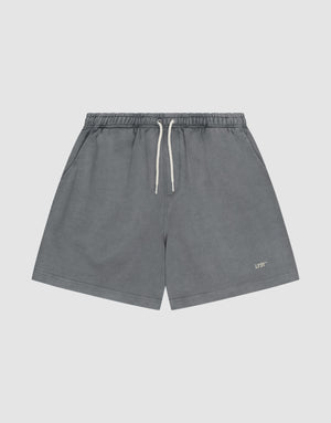 LIVE FAST DIE YOUNG Basic Sweat Shorts in gray with an elastic waistband, side pockets, and a small “LIFT” logo print on the lower left leg, shown against a plain light background. | plain