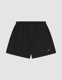LIVE FAST DIE YOUNG Basic Sweat Shorts in plain black, featuring an elastic waistband, drawstring, side pockets, and a small white logo print on the left leg, shown on a light gray background. | plain