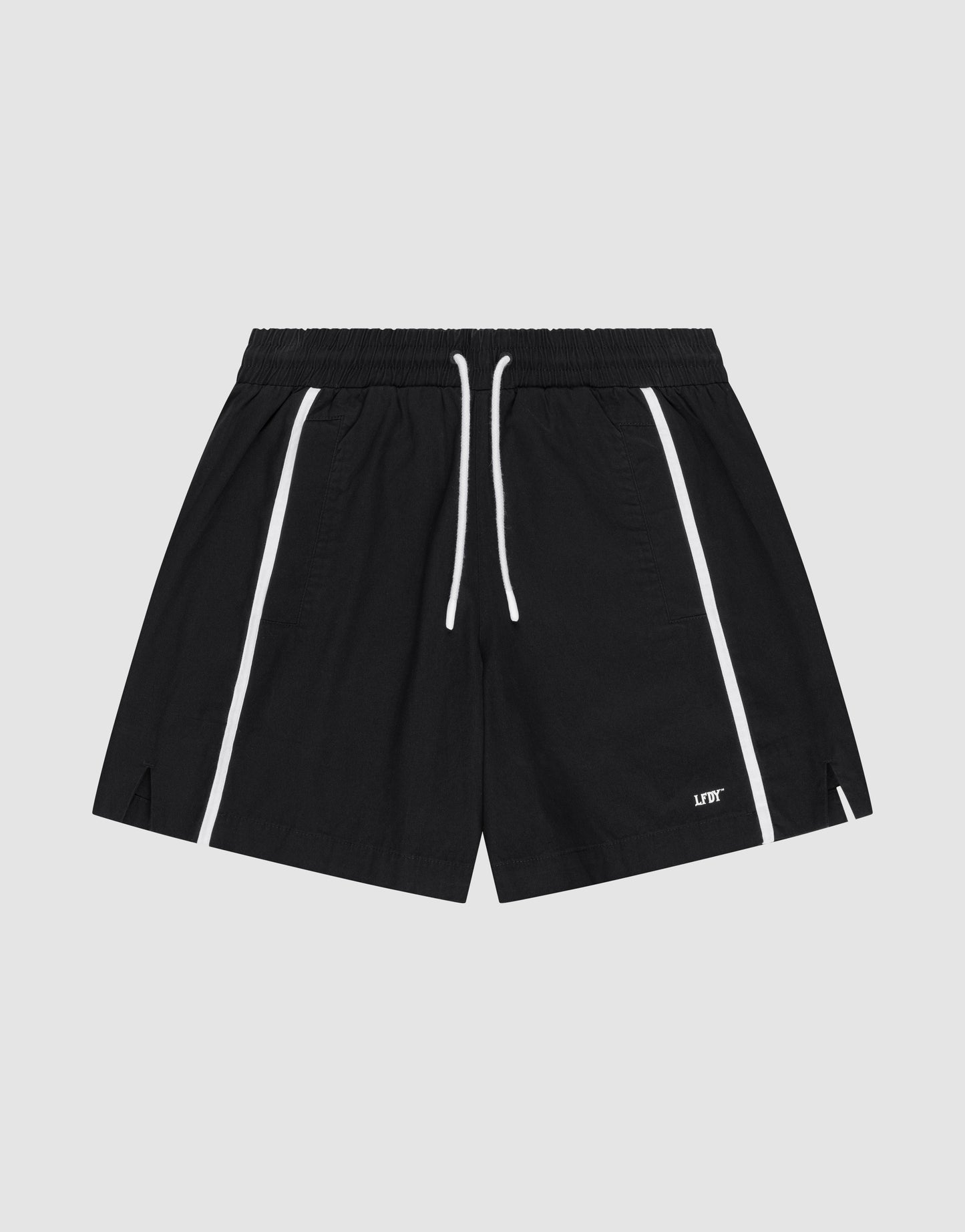 The Basic Cotton Shorts by LIVE FAST DIE YOUNG are black, Regular Fit athletic shorts with white stripes, a white drawstring, small side slits, and a bold "LDT" logo print near the left hem.