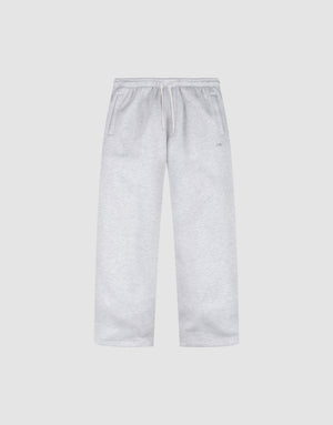 The Basic Wide Jogger by LIVE FAST DIE YOUNG features a light grey color, oversized fit, elastic waistband with drawstring, and side pockets, shown laid flat on a plain white background. | plain