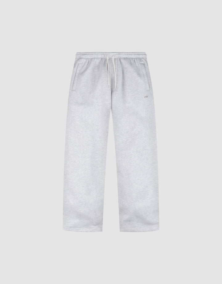 The Basic Wide Jogger by LIVE FAST DIE YOUNG features a light grey color, oversized fit, elastic waistband with drawstring, and side pockets, shown laid flat on a plain white background. | plain