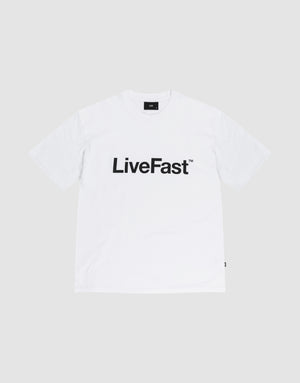 The Basic LiveFast Tee by LIVE FAST DIE YOUNG is a Regular Fit plain white T-shirt featuring a bold black "LiveFast™" front print, laid flat on a light gray background. Crafted from 100% Baumwolle for comfort and style. | plain