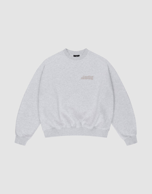 The Basic Melange Sweater by LIVE FAST DIE YOUNG in light gray features an oversize fit, subtle front and back prints on the left chest, ribbed cuffs, collar, and hem. Crafted from soft cotton for comfort. Displayed flat on a white background.