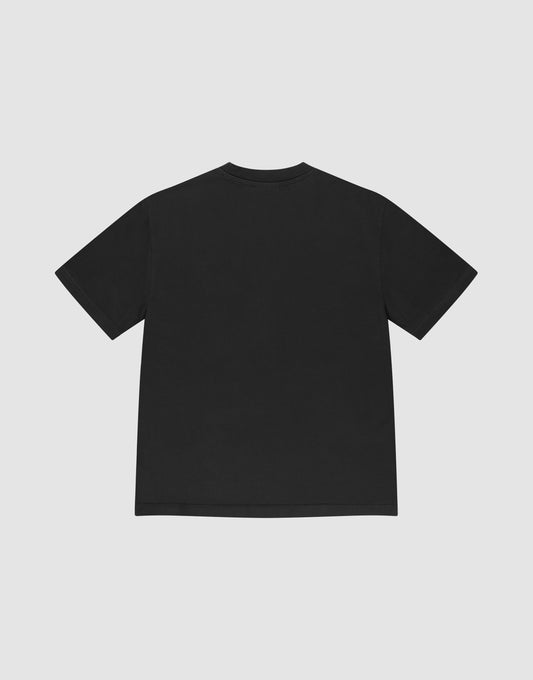 The LIVE FAST DIE YOUNG Basic Tee, a plain black oversized short-sleeve shirt, is displayed laid flat from the back on a light grey background.