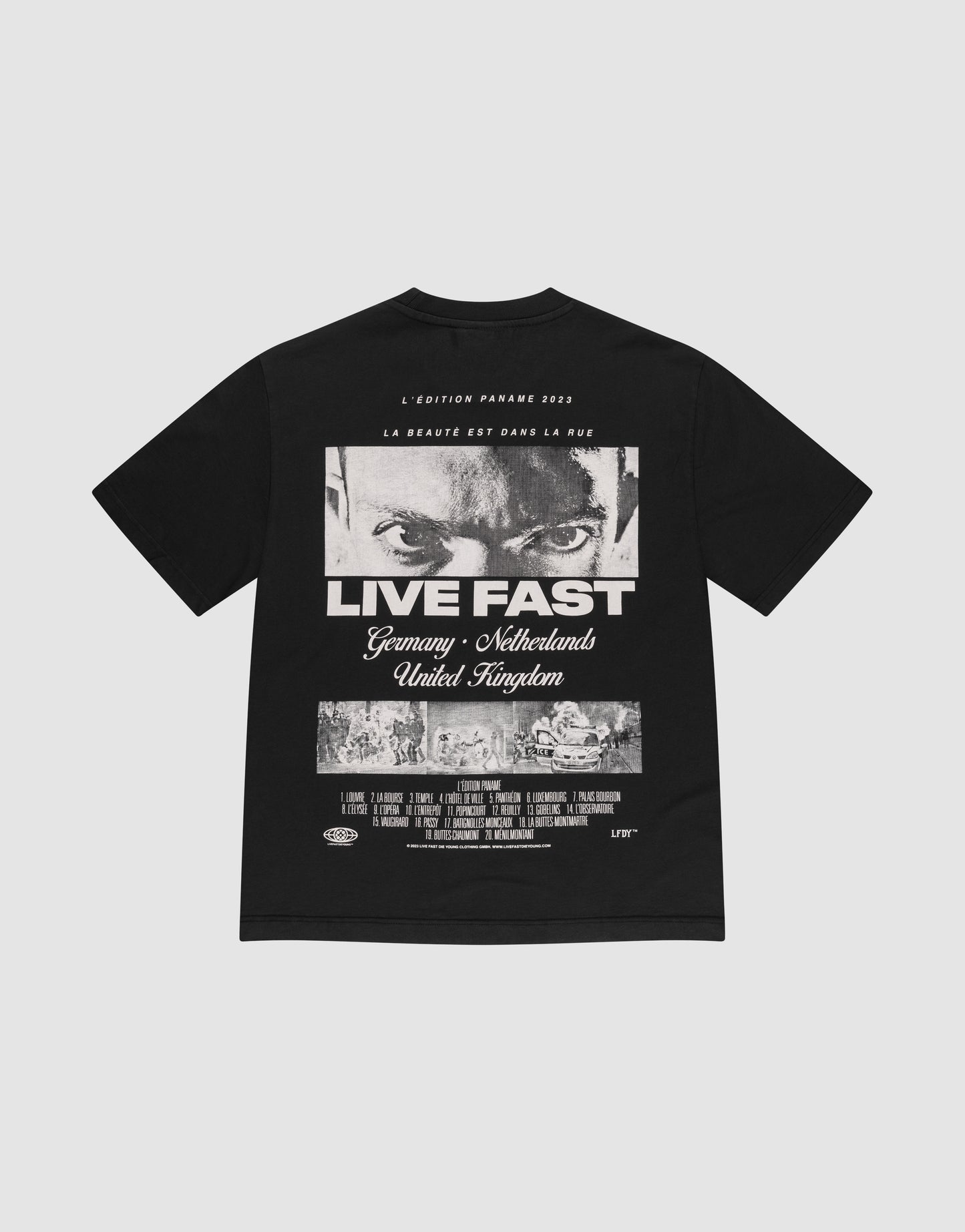The LFDY Cinema Tee by LIVE FAST DIE YOUNG is an oversized black 100% cotton shirt with a front and back print—intense eyes, "LIVE FAST" graphic, film-style credits, French text above, plus countries and cities listed.
