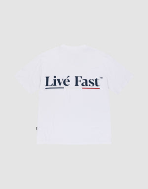 The Live Fast Paris Tee by LIVE FAST DIE YOUNG is a white Regular Fit T-shirt made from 100% Baumwolle, featuring bold black "Livé Fast™" with a red underline across the back and both front and back prints. | plain