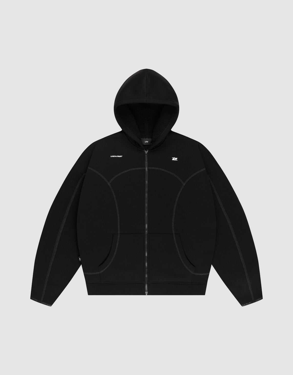 The LIVE FAST DIE YOUNG LFDY Active Fleece Hooded Zip is a black oversize hoodie with curved seam details and white logo prints on the left chest and right shoulder, shown on a plain light gray background. | plain