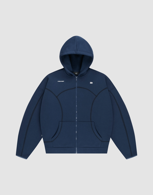 The LFDY Active Fleece Hooded Zip by LIVE FAST DIE YOUNG is a navy oversized zip-up hoodie with a hood, front pockets, black curved seams, and a small white chest logo, made from premium Baumwolle and shown on a light gray background. | plain