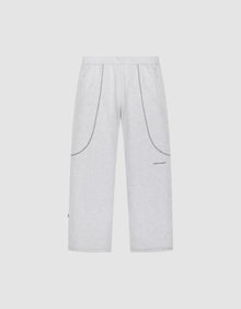 The LFDY Active Fleece Jogger by LIVE FAST DIE YOUNG features a wide fit, light gray color, elastic waistband, two side pockets, curved seam details, and a small logo print on the left thigh, shown on a plain white background. | plain