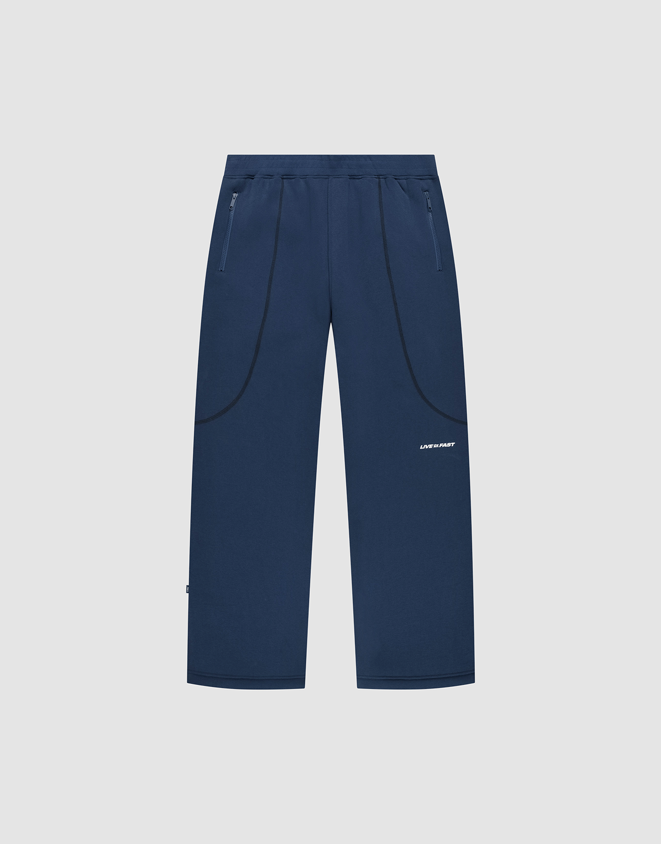 The LFDY Active Fleece Jogger by LIVE FAST DIE YOUNG features a navy blue wide fit, straight legs, zippered side pockets, black curved seam details, and a small white logo on the right thigh, shown on a light gray background.