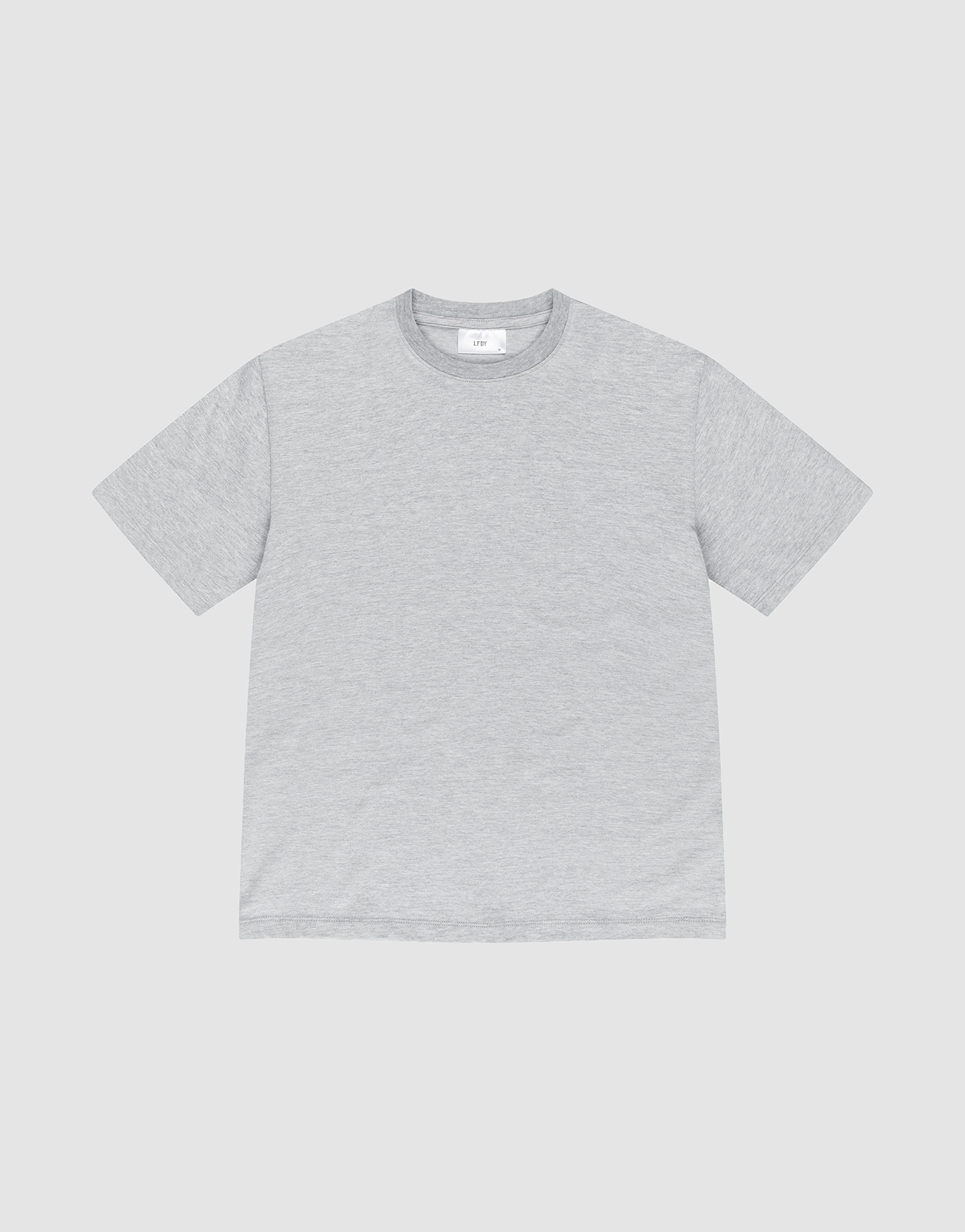 The LFDY Slim Tee by LIVE FAST DIE YOUNG is a plain, short-sleeved light gray slim fit T-shirt made of cotton, shown flat on a white background with a classic crew neckline and no visible designs or logos. | plain