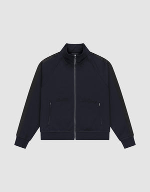 The LFDY Striped Track Jacket by LIVE FAST DIE YOUNG features a navy zip-up design with raglan sleeves, black side stripes, two front zip pockets, and subtle chest embroidery, laid flat on a light gray background. | plain