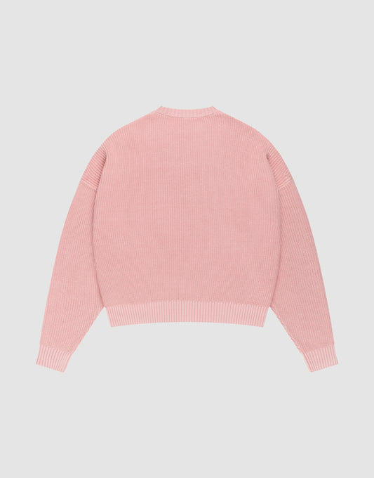 The LFDY Knit Sweater by LIVE FAST DIE YOUNG, in light pink with long sleeves, ribbed knit, oversized fit, and dropped shoulders, is laid flat on a plain white background with the back facing up.