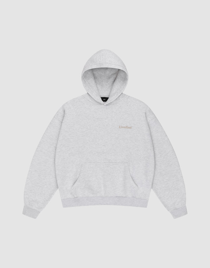 The LIVE FAST DIE YOUNG Basic 360 Hooded is a light gray Oversize Fit sweatshirt with a front pocket and subtle Livefast text on the left chest, made from soft Baumwolle and shown on a plain white background.