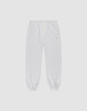 The LIVE FAST DIE YOUNG Basic Loose Jogger features light gray fabric, an Elastik-Bund waistband with white drawstring, side pockets, and elastic cuffs. The soft material and loose fit offer comfort for casual or athletic wear. | plain