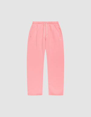 The Basic Wide Jogger by LIVE FAST DIE YOUNG features an oversized fit, elastic waistband, white drawstring, and side pockets, shown in pink laid flat on a light gray background. | plain