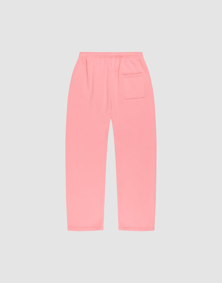 The LIVE FAST DIE YOUNG Basic Wide Jogger in light pink features an oversized fit, elastic waistband, and a right-side patch pocket, shown laid flat on a plain light gray background.