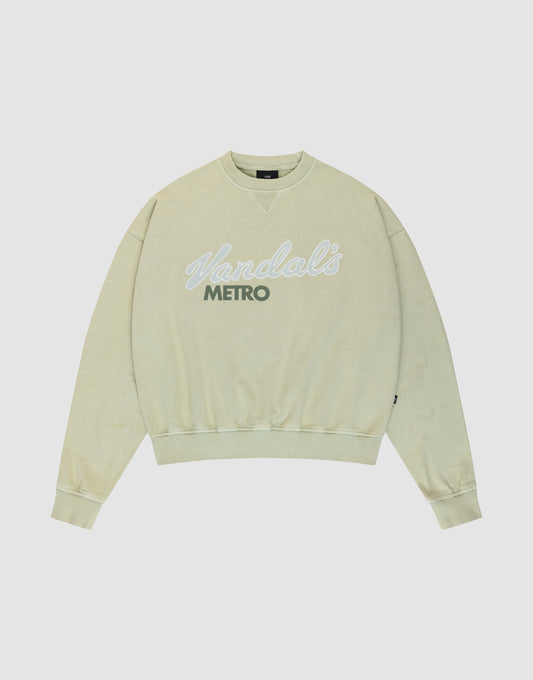 The LFDY Vandals Sweater by LIVE FAST DIE YOUNG is a light beige, 100% Baumwolle crewneck with an oversize fit and "Vandals METRO" in white and dark green lettering, shown laid flat on a plain white background.